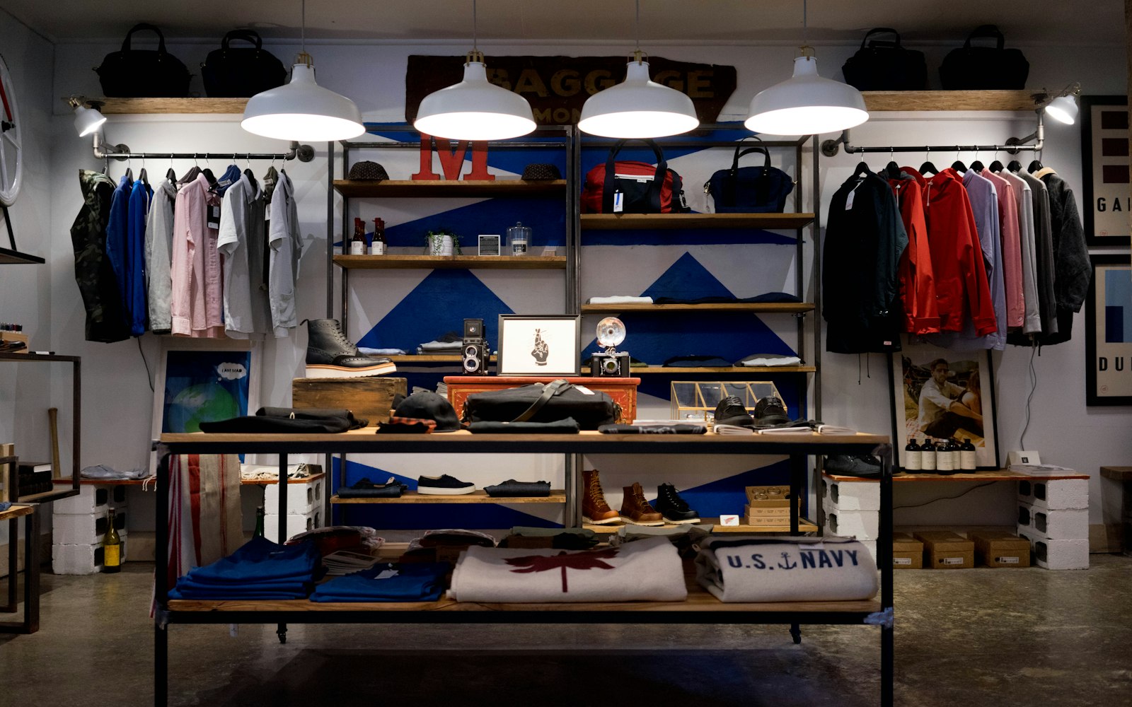 Lifestyle assortment with suitcase, headphones, lamp and everyday essentials